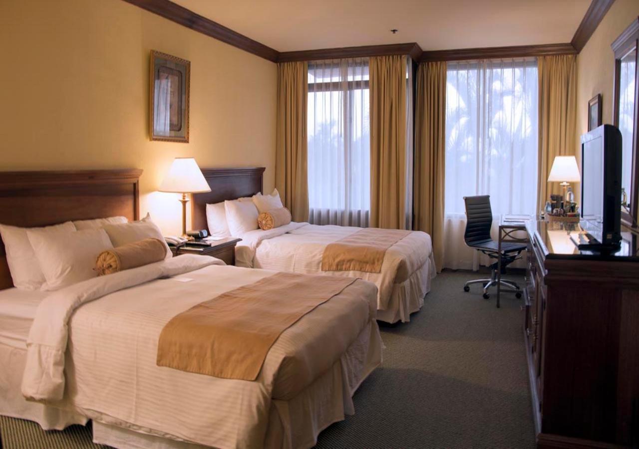 Queen Room Two Queen Beds Pool View Non-Smoking