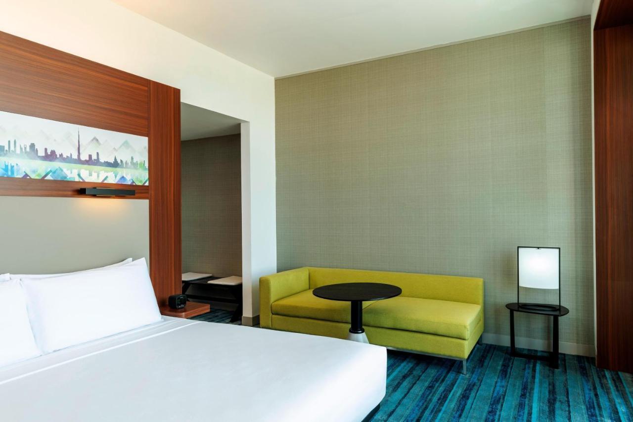 Savvy Suite – King Bed Living Room Two Bathrooms Complimentary Shuttle to Expo Metro Station & Al Maktoum International Airport