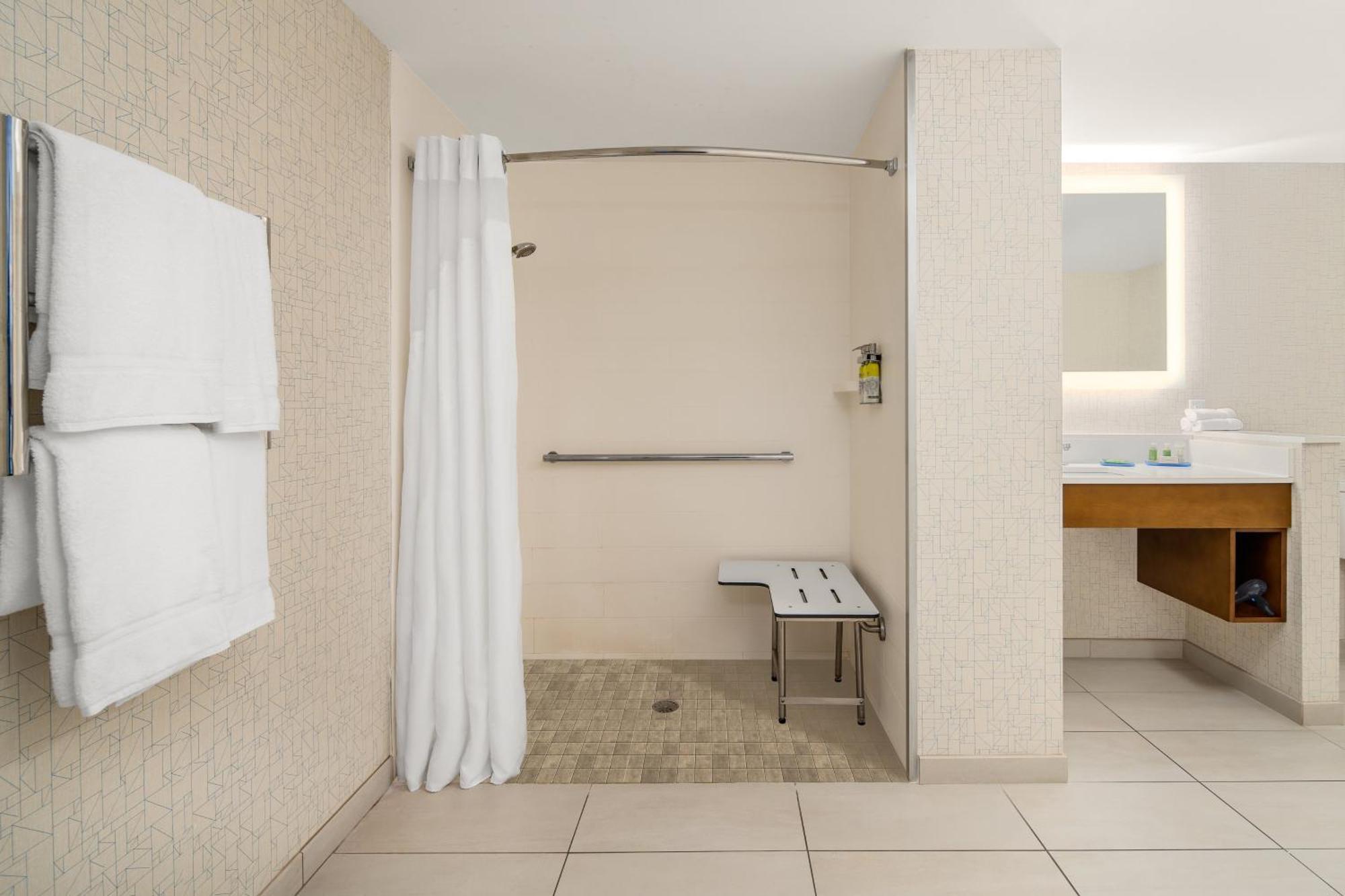 Queen Room with Two Queen Beds Hearing Accessible with Roll-In Shower - Non-Smoking