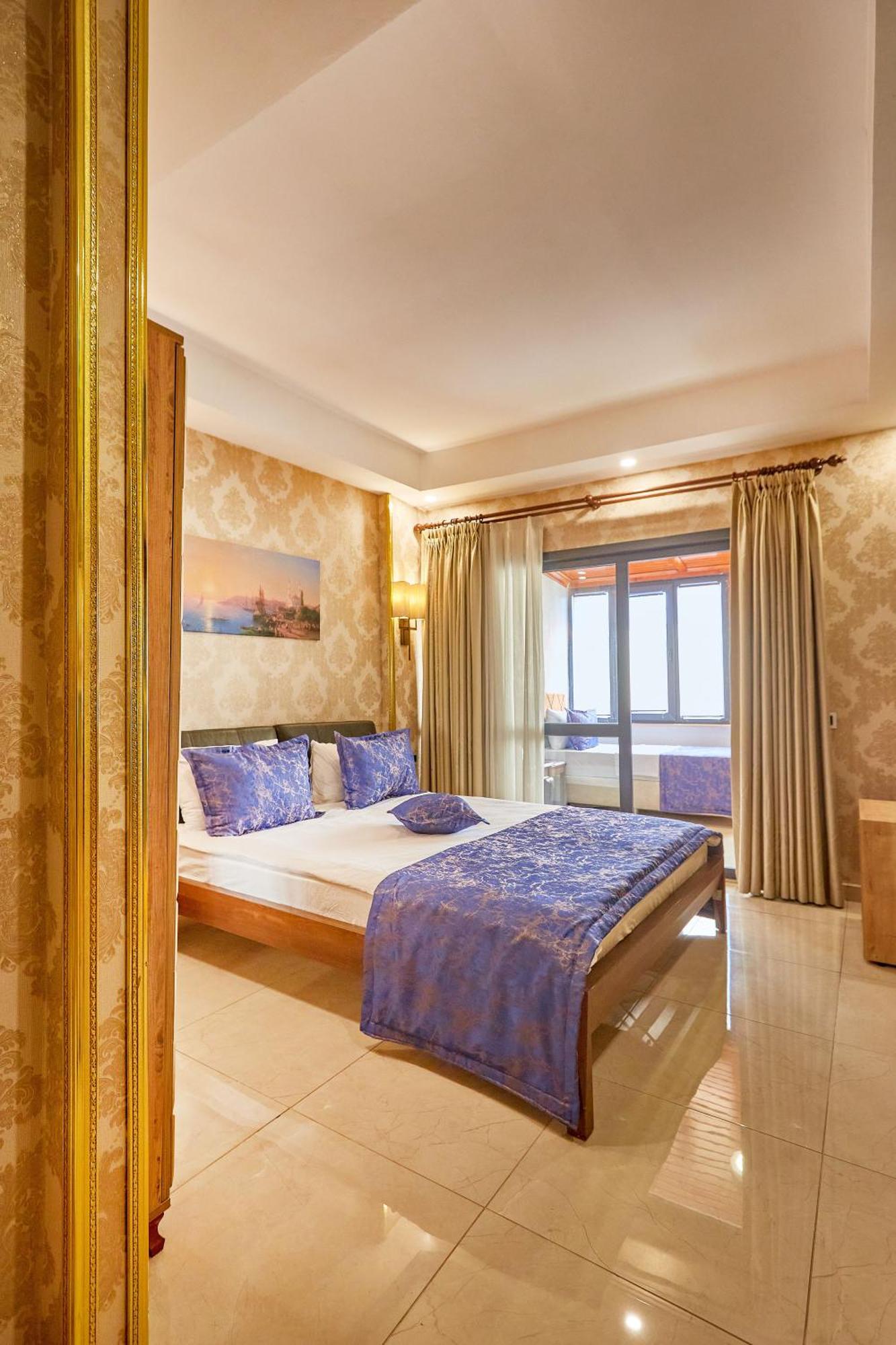 Superior Triple Room with Balcony