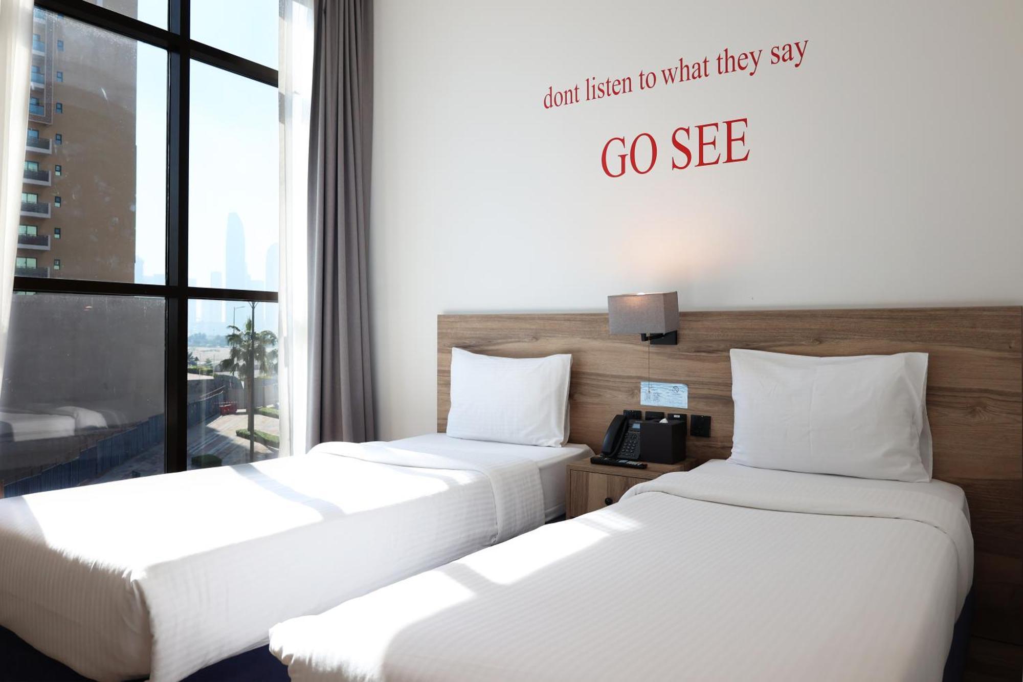 Deluxe Room Twin Bed City View includes F&B