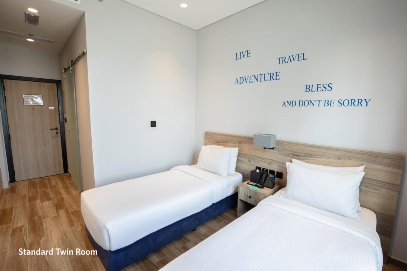 Deluxe Room Twin Bed City View includes F&B