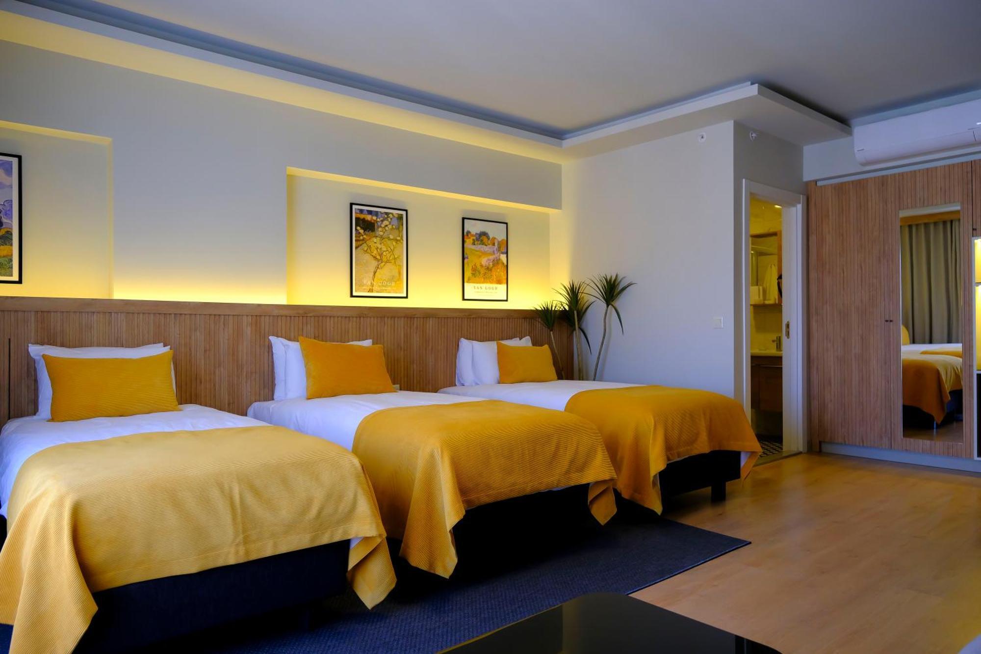 Grand Deluxe Triple Room