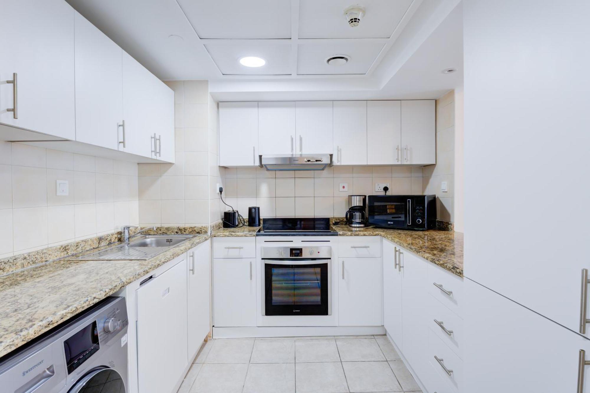One-Bedroom Apartment Balcony Lake View Shuttle Service to JBR Beach Access to The Market Mall