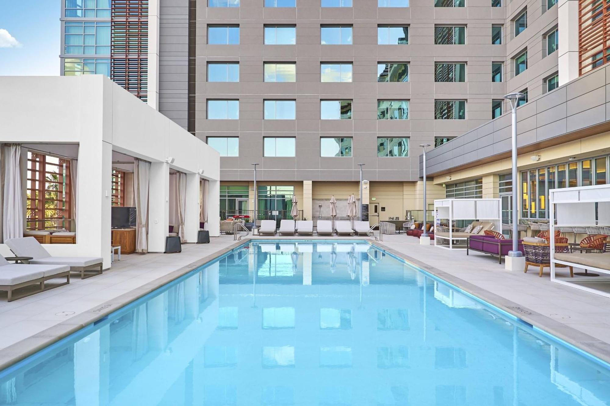 Queen Room Two Queen Beds Pool View Hearing Accessible